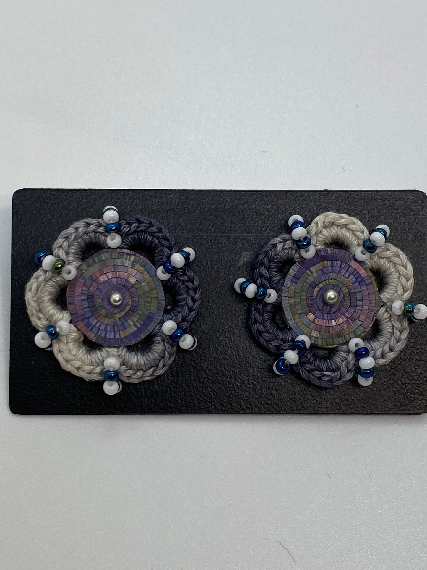 Colombian straw marquetry button earrings and blue-gray hook with silver stud